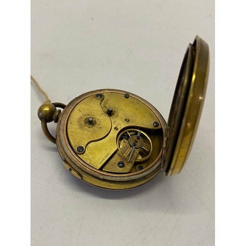 296 - A RailwayTimekeeper watch, gold and silver dial, in a gilt metal case