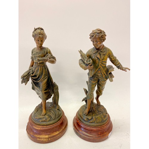 301 - A pair of 19th Century spelter figures, male and female after Bruchon - 15 1/2in. high