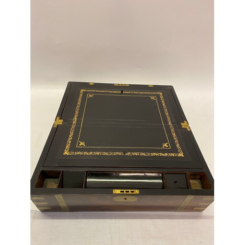 325 - A 19th Century mahogany and brass banded writing box, the interior in black and gilt tooled leather ... 