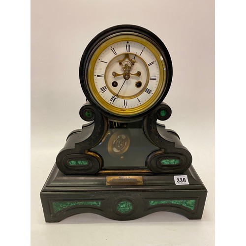 330 - A Victorian mantel clock with white enamel dial, visible escapement, in a black slate case with mala... 