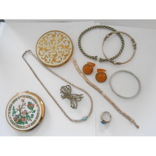 212 - A selection of silver and silver coloured metal jewellery including bangles, earrings, rings, three ... 