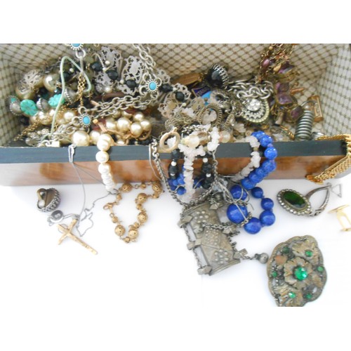 213 - A walnut and inlaid glove box containing a selection of costume jewellery including paste set buckle... 