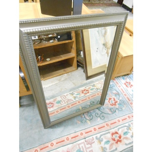 78 - A modern rectangular bevelled wall mirror in a grey frame - 45in. x 50in., one other rectangular wal... 