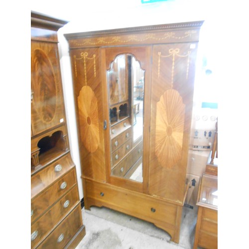 118 - An Edwardian mahogany and satinwood inlaid wardrobe with harebell decoration, fitted centre mirrored... 