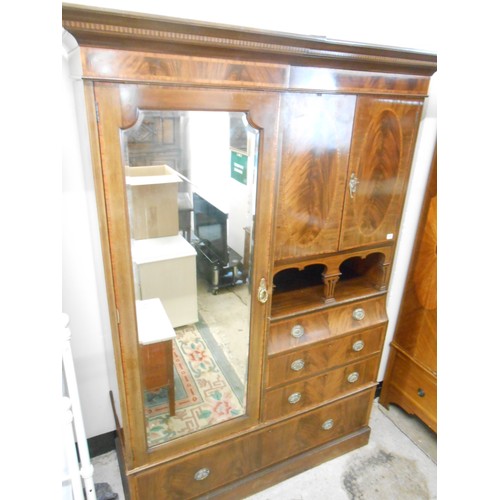 119 - An Edwardian mahogany and inlaid Beaconsfield style wardrobe fitted mirrored door flanked by two pan... 