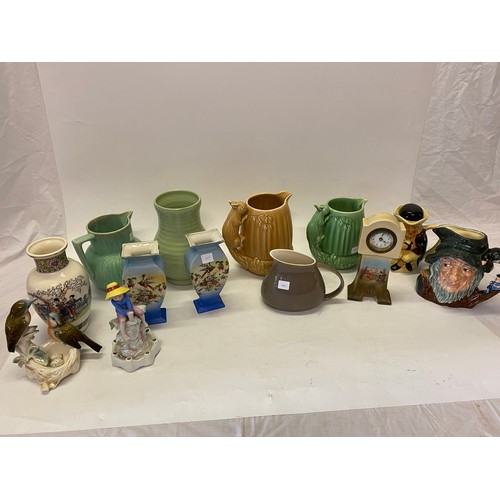 155 - A selection of decorative china including an Amphora figure of a girl, Royal Doulton character jug, ... 