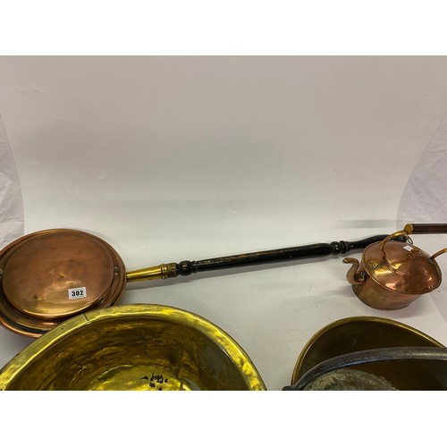 302 - Three preserve pans, copper kettle and copper warming pan
