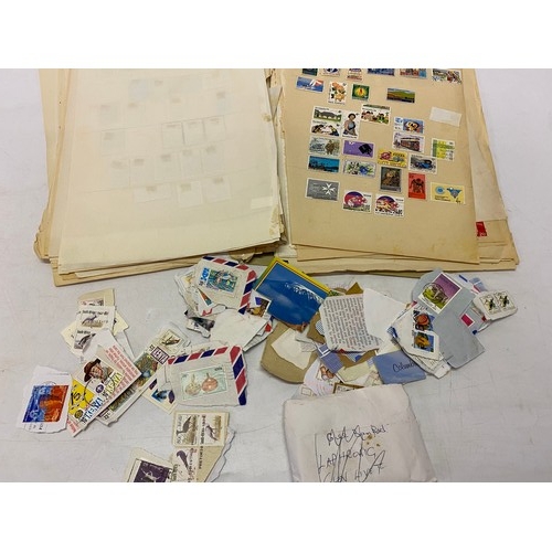 29 - A quantity of stamps on loose leaves