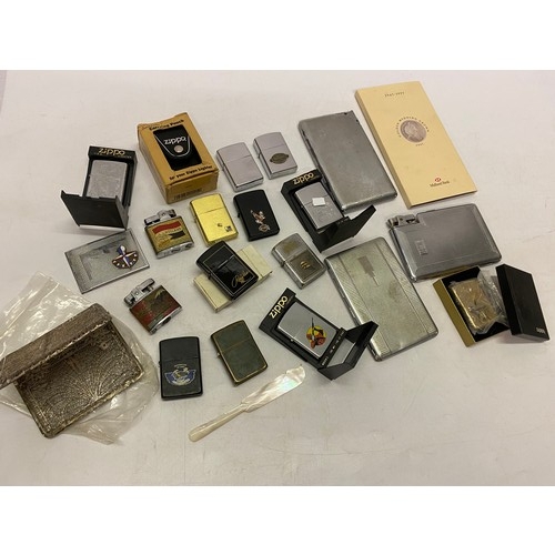 302 - A quantity of Zippo cigarette lighters and cigarette cases and lighters combined