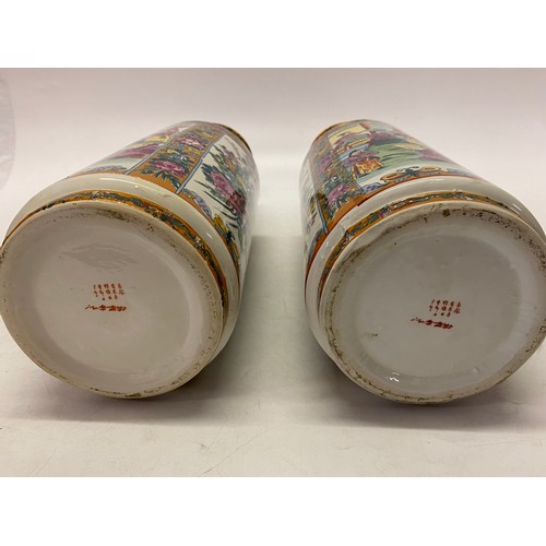 118 - A pair of Chinese cylindrical vases decorated musicians - 16in. high and a pair of Japanese baluster... 