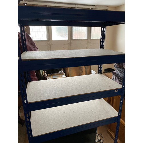 44 - A three bay Dexion style shelving unit in blue