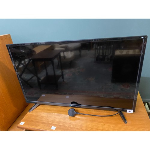 50 - A Sharp Aquos flatscreen television and a Blaupunkt flatscreen television