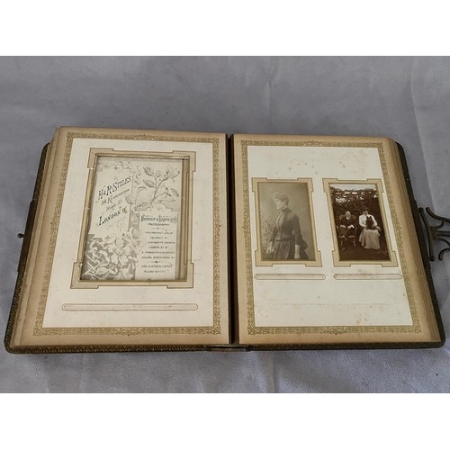 11 - A Victorian brown leather photograph album and contents and a writing album containing sketches, ver... 