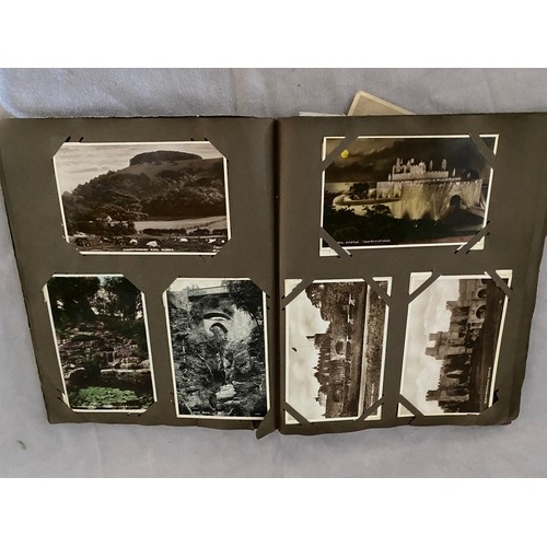 10 - A postcard album containing early 20th Century black and white and coloured postcards