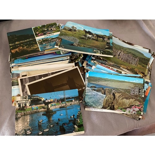 12 - A quantity of coloured and black and white postcards including  Tower Bridge, topographical etc..