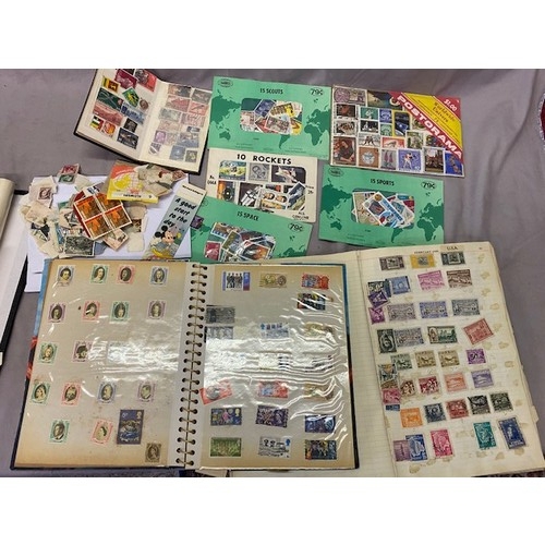 13 - A selection of stamp albums, loose stamps etc..