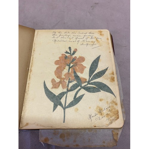 11 - A Victorian brown leather photograph album and contents and a writing album containing sketches, ver... 