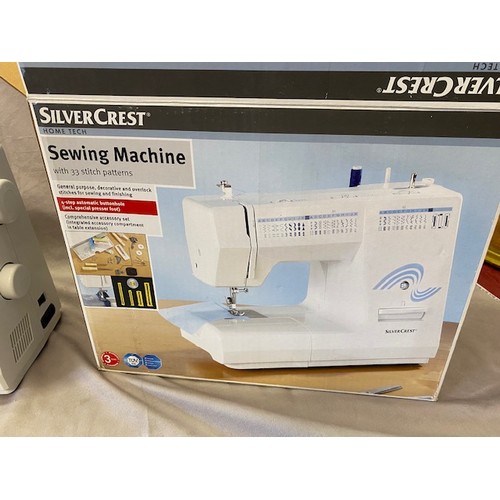 20 - A Silver Crest electric sewing machine in box