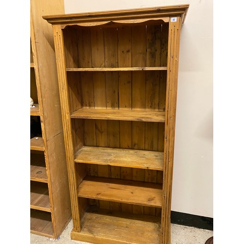 42 - A pine openfront bookcase fitted four adjustable shelves - 34in. wide