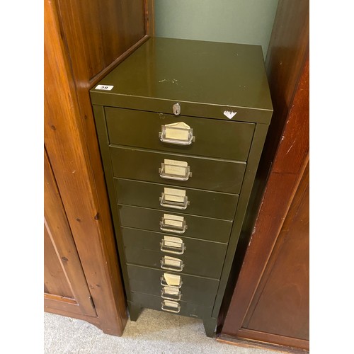 30 - A green sprayed metal filing cabinet fitted nine drawers