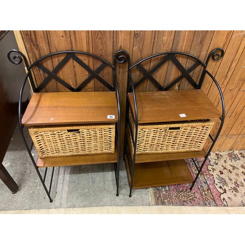 44 - A pair of black sprayed metal and wood three tier stands and two wicker baskets - 15 3/4in. wide