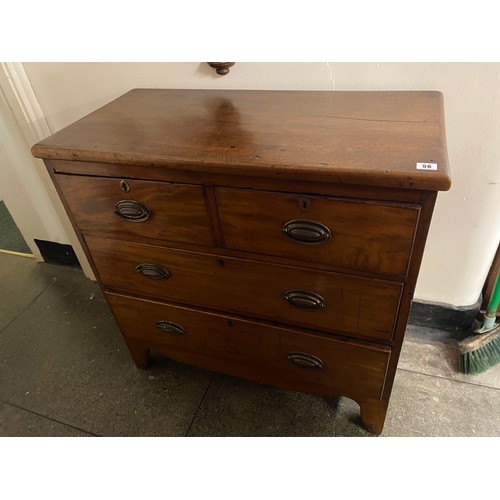 56 - A 19th Century mahogany straight front chest fitted two narrow and two wide drawers, oval brass back... 