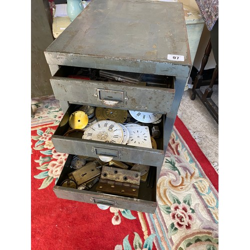 97 - A grey metal filing chest containing clock dials, Georgian and later hands, pocket watch glasses, to... 