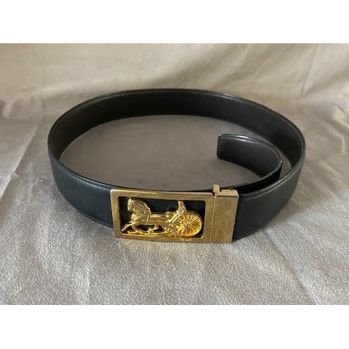 147 - A vintage Celine brown calf leather reversible belt with gilt metal horse and carriage buckle, stamp... 