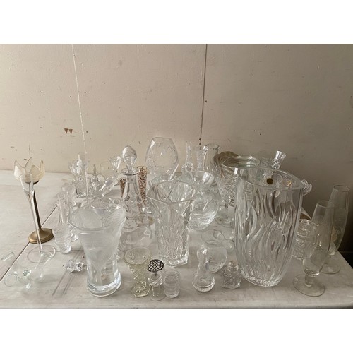 152 - A selection of items including a purse vase, vase with etched flowers, jugs, decanter, hocks, dressi... 