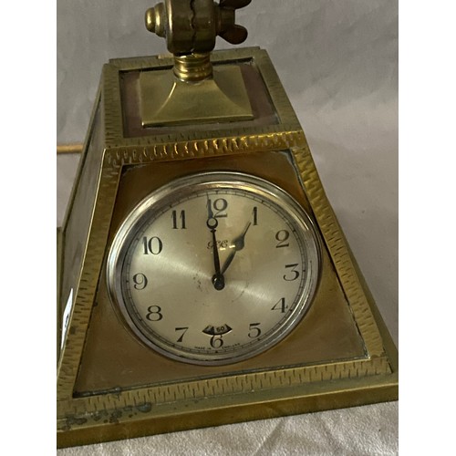 49 - A desk lamp with inset clock to the base