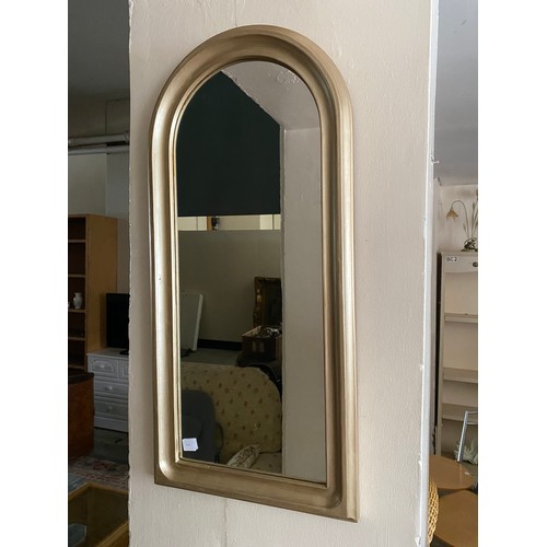 44 - Two four wheeled shopping trollies and a gilt framed wall mirror - 29in. x 13 1/2in.