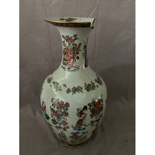 215 - A 19th Century Chinese baluster form vase decorated all round with figures and precious items (af) -... 