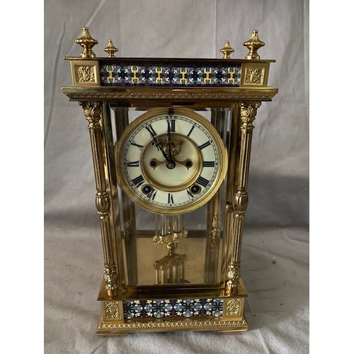 258 - A 19th Century French mantel clock with white enamel dial, visible escapement, in a four glass case ... 