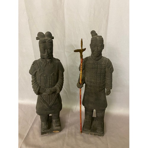 117 - A pair of terracotta warriors with impressed script to the base - 17in. high