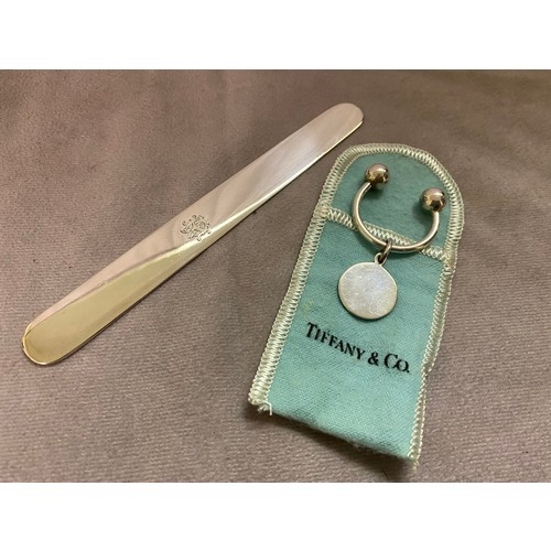 165 - An Aspreys silver letter opener - London 1902 plus a Tiffany sterling silver key ring