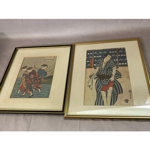 17 - A Japanese woodblock print by Utagawa Kuniyoshi entitled Actors, mounted, framed and glazed - 11 1/2... 