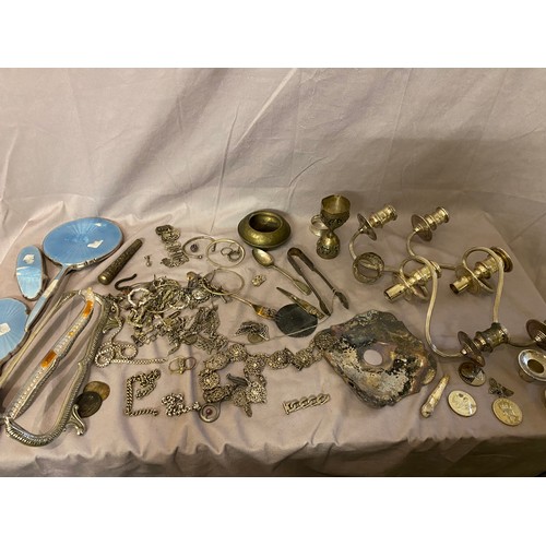 202 - A selection of silver plated items including two three branch candelabra tops, hand mirror, belt, Ea... 