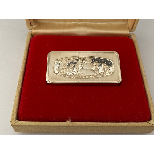 194 - A Franklin Mint silver ingot for Christmas 1974, in fitted box