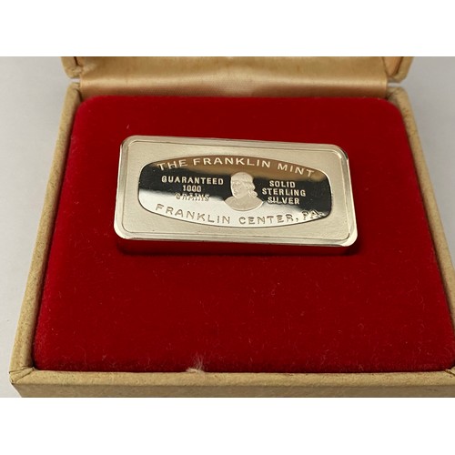 194 - A Franklin Mint silver ingot for Christmas 1974, in fitted box