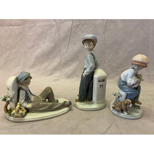 109 - Three Lladro figures of a boy with a mile stone, the largest - 8 1/2in. high