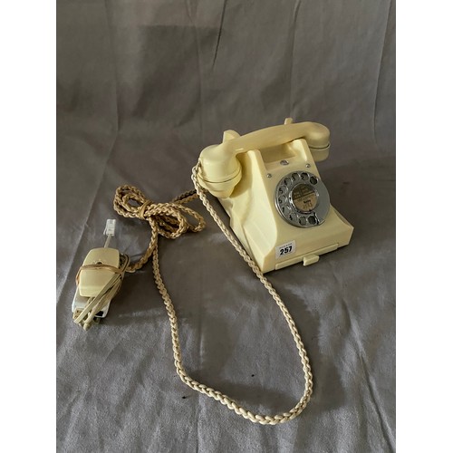 257 - An ivory coloured 1950's GPO 332 series telephone