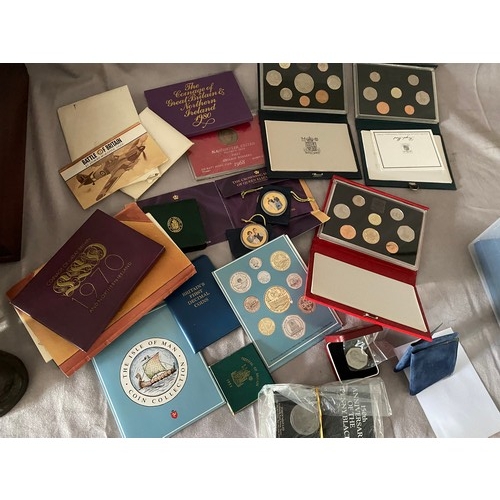 251 - A collection of coins including Great Britain coin sets etc..