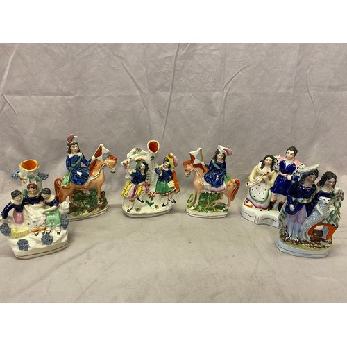 142 - Six small 19th Century Staffordshire figural groups, the largest - 7 1/2in. high