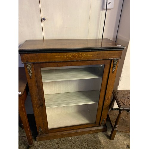 86 - A Victorian walnut and satinwood inlaid pier cabinet fitted glass panelled door - 30in. wide