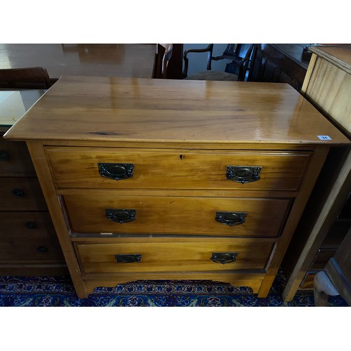 34 - A walnut straight front chest fitted three wide drawers - 36in. wide