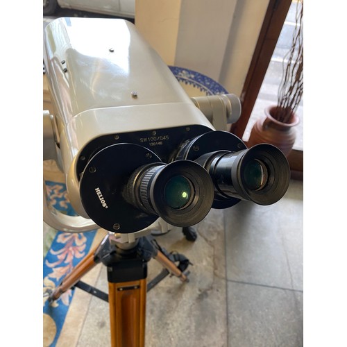 99 - A Helios high magnification binoculars complete with wooden tripod