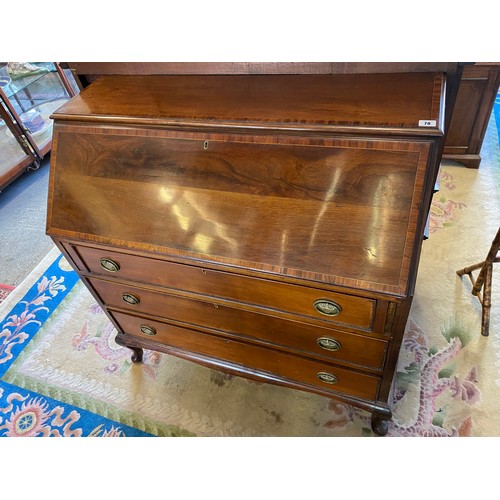 78 - An Edwardian mahogany bureau with crossbanded hinged fall front enclosing fitted interior above thre... 