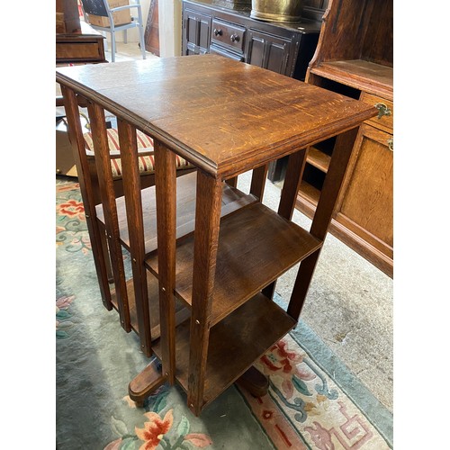 58 - An Edwardian oak revolving bookcase - 36in. high