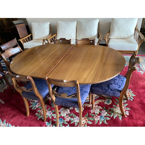 41 - A set of six (including two carvers) Regency mahogany dining chairs with carved rail backs, stuff ov... 