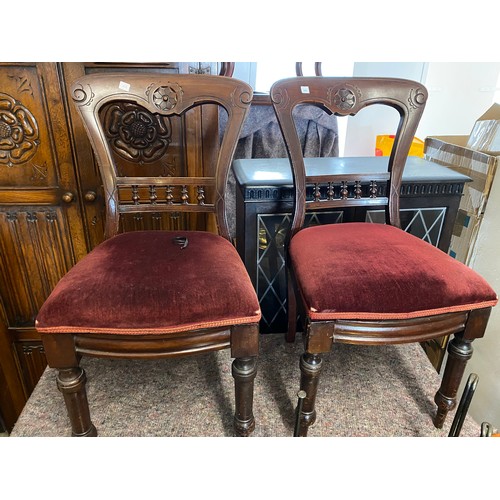 103 - An Edwardian mahogany tub chair, two Victorian mahogany framed dining chairs and an oval wall mirror... 